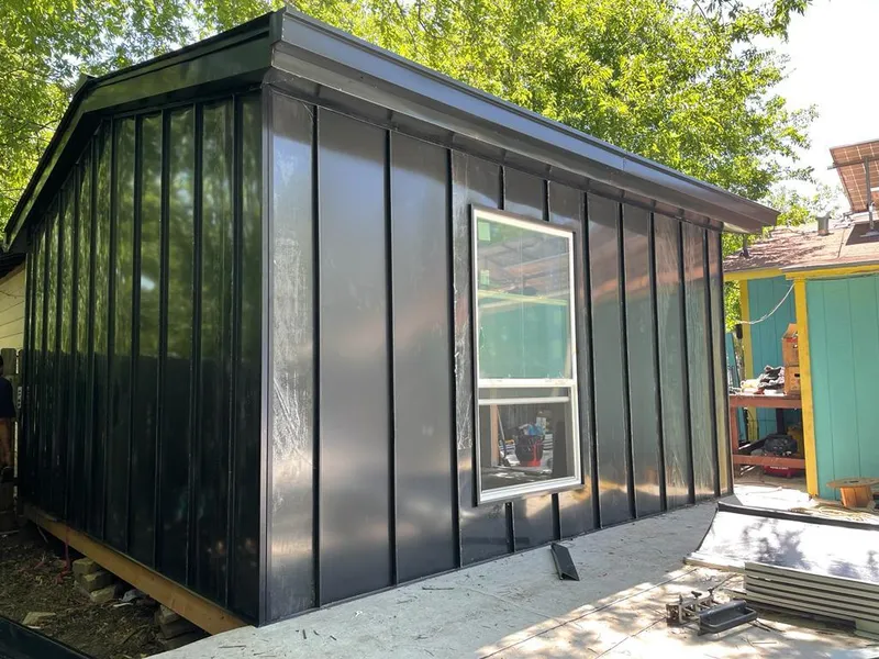 Black standing seam metal wall panels for Metal Roof Installation in Martinsville