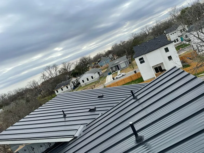 Standing seam metal roof panels with vents for Skylight Repair in Martinsville